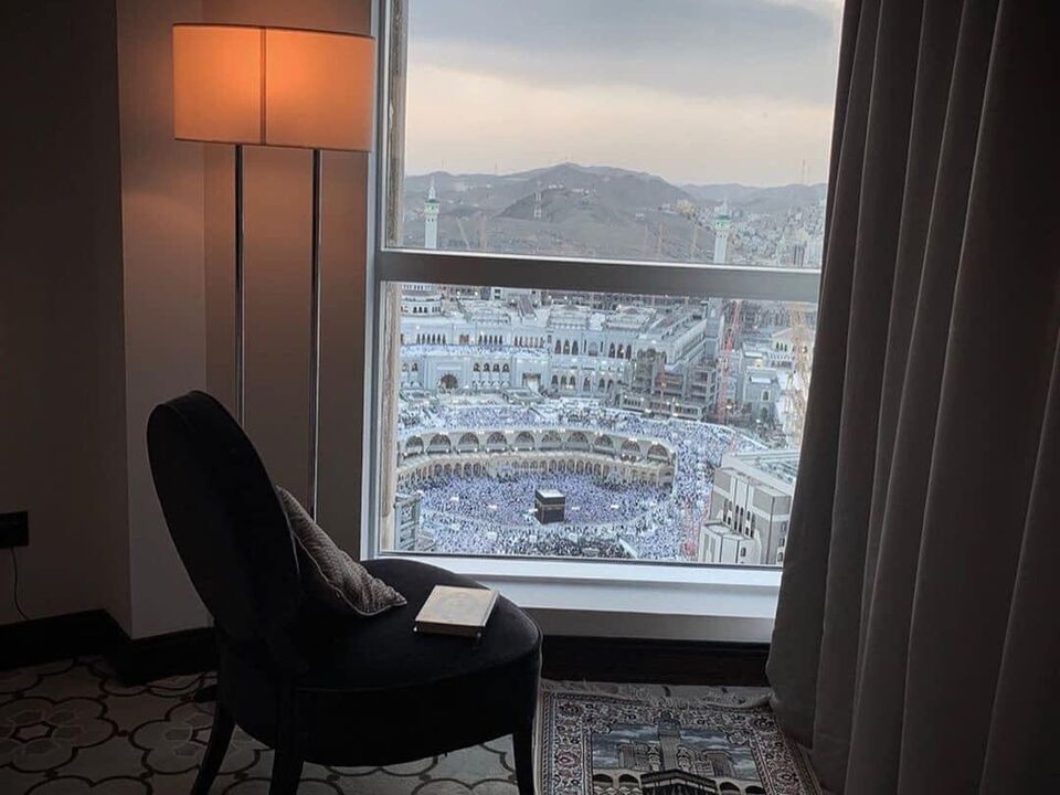 Full Kaaba view from a hotel room window, looking straight down onto the mataf